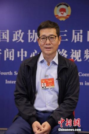 　　图为3月5日，赵小津在全国政协十三届四次会议新闻中心网络视频采访间接受采访。 中新社记者 王潮 摄